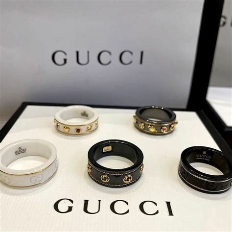 gucci icon ring on hand|Gucci icon ring with gemstones.